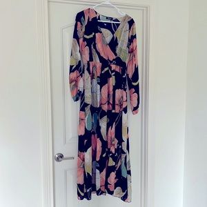 Beautiful long sleeve floral dress! Only worn a couple of times.